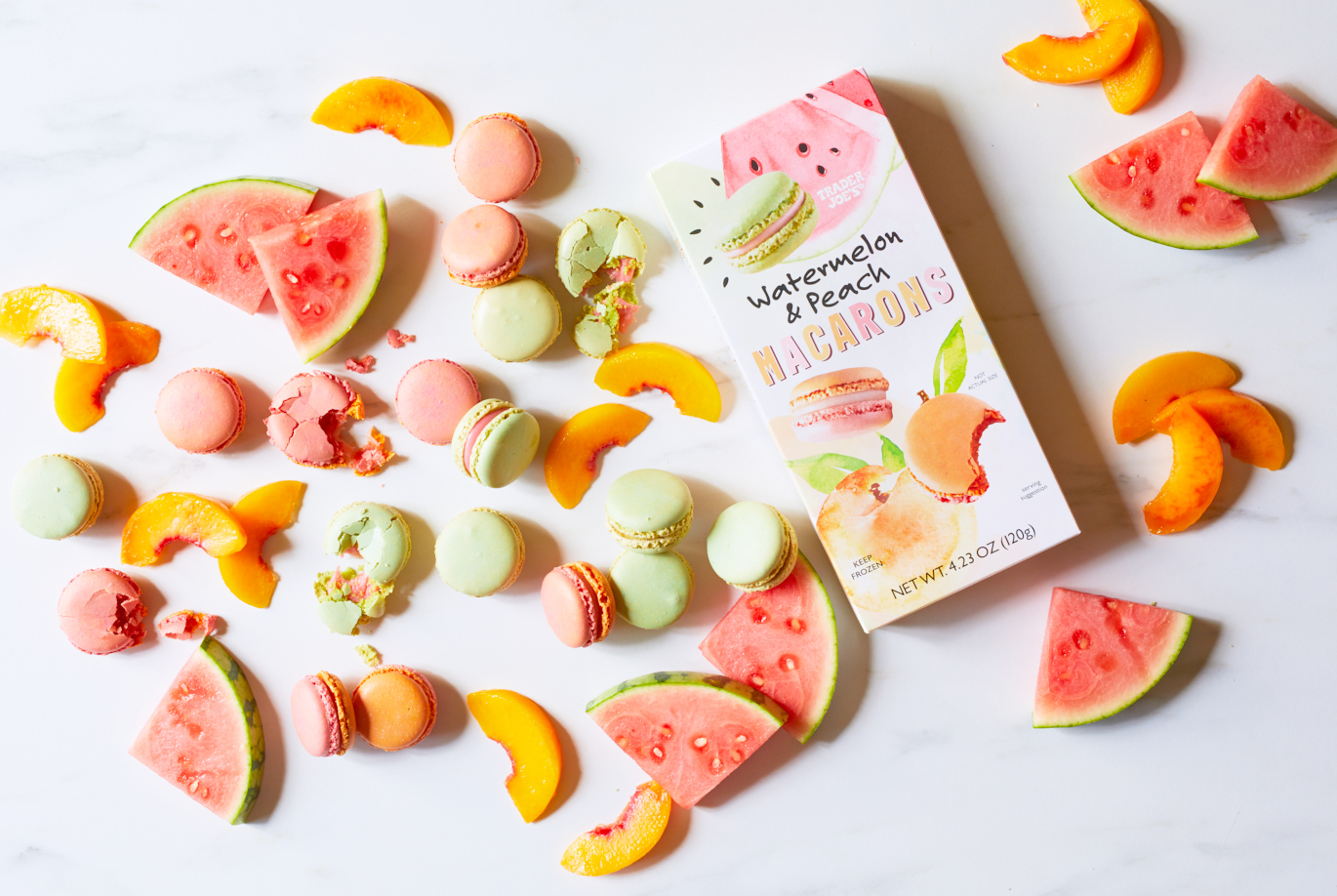 peach and watermelon macarons